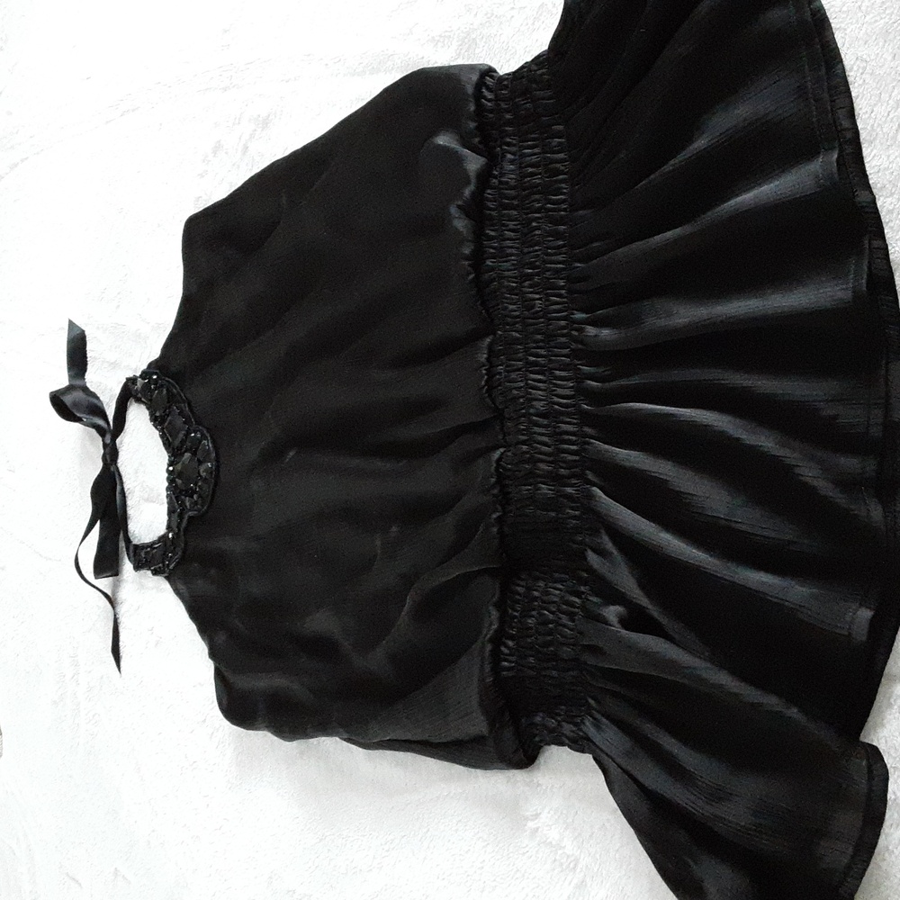 Black open back blouse size medium.